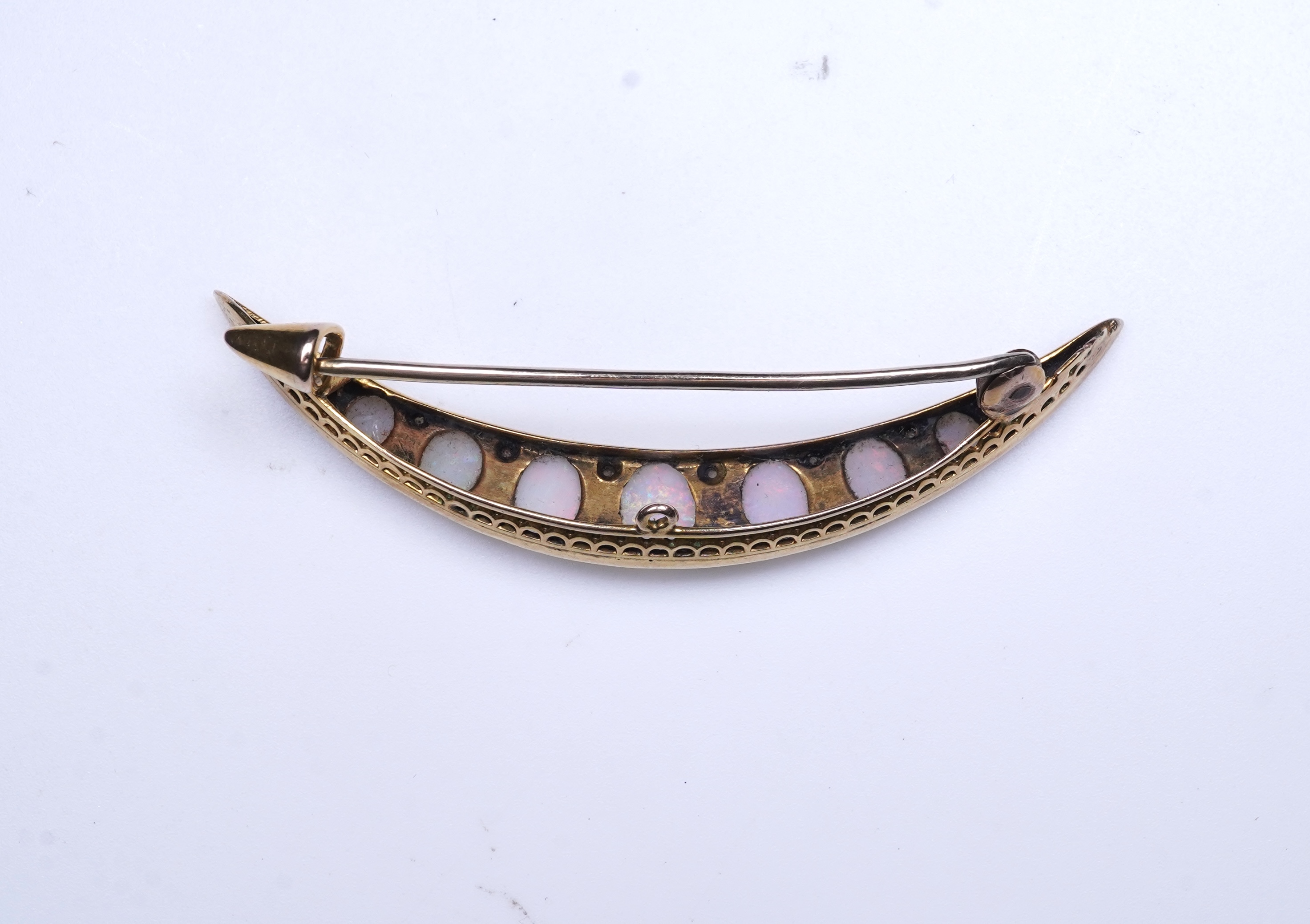 An opal and diamond brooch, early 20th century